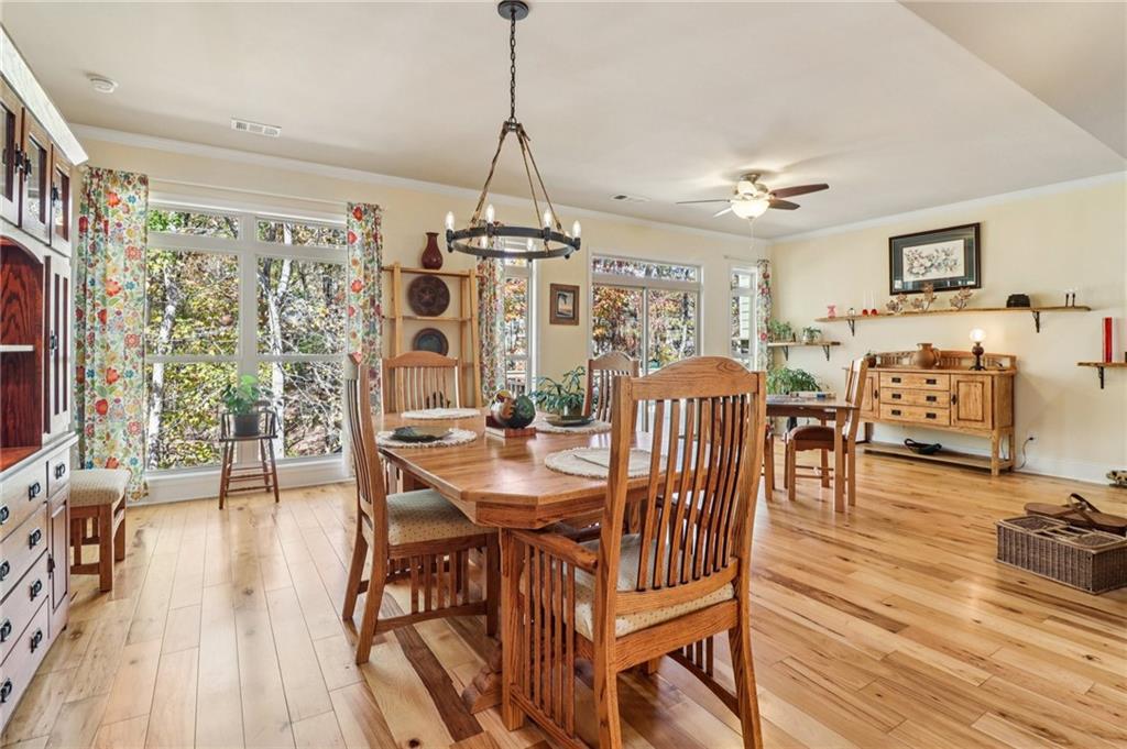 2007 Eagles Ridge Waleska, GA 30183 - Photo 8 of 45 a view of a dining room with furniture window and wooden floor