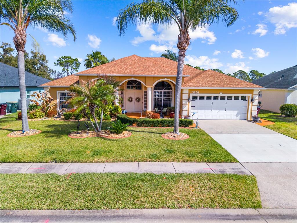 front view of house with a yard