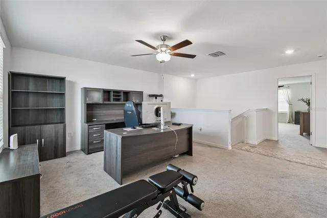 an aerial view of a house with swimming pool