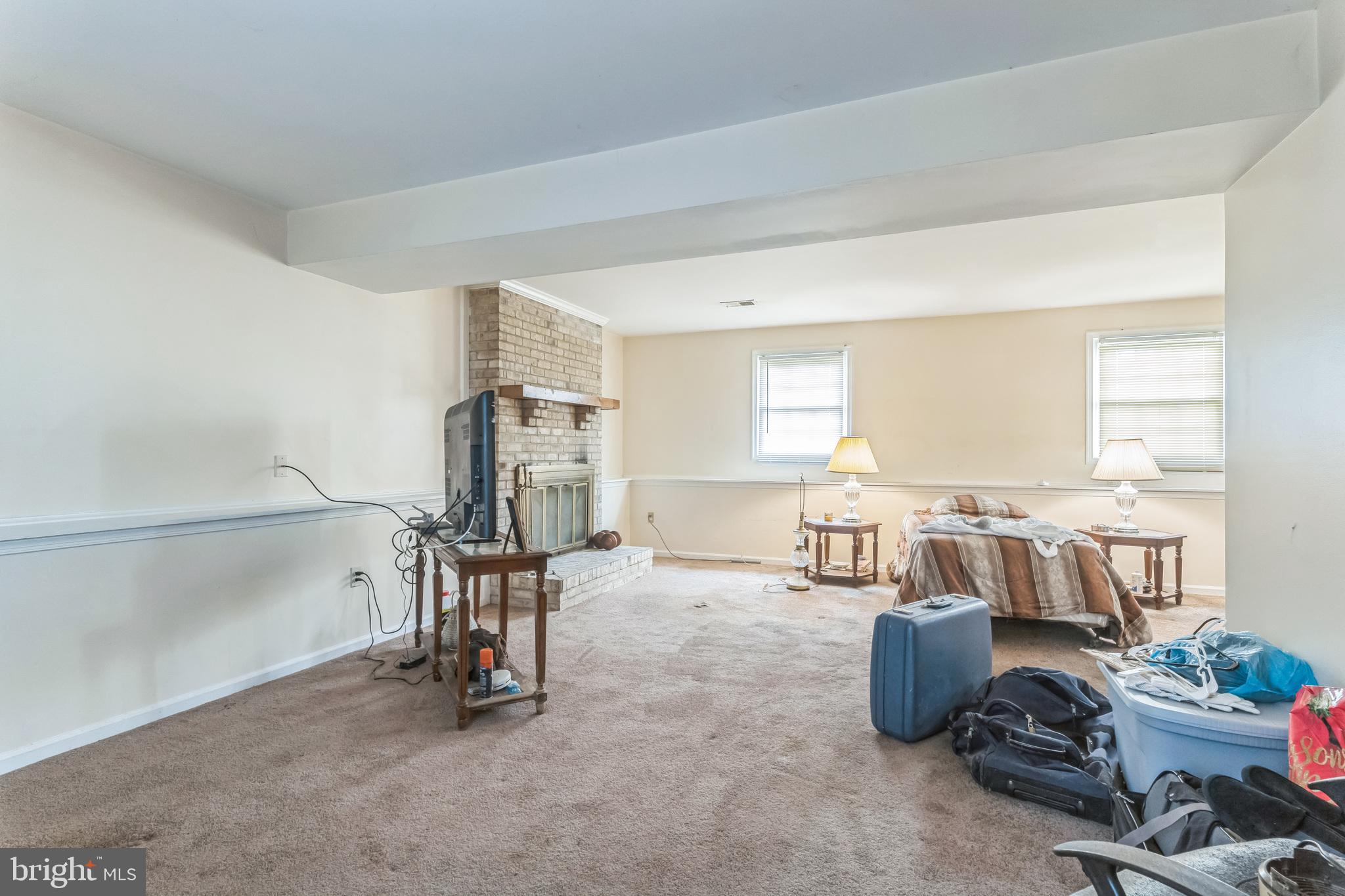 10200 Balsamwood Drive Laurel, MD 20708 - Photo 11 of 11 a room with furniture and gym equipment