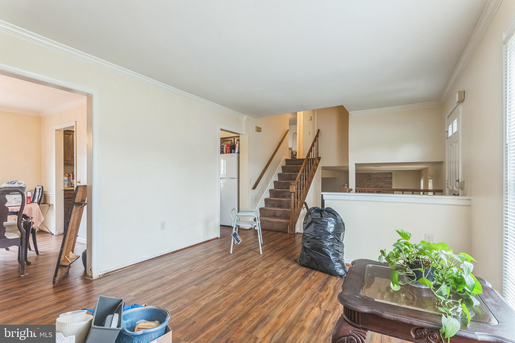 10200 Balsamwood Drive Laurel, MD 20708 - Photo 2 of 11 a room with furniture and a wooden floor