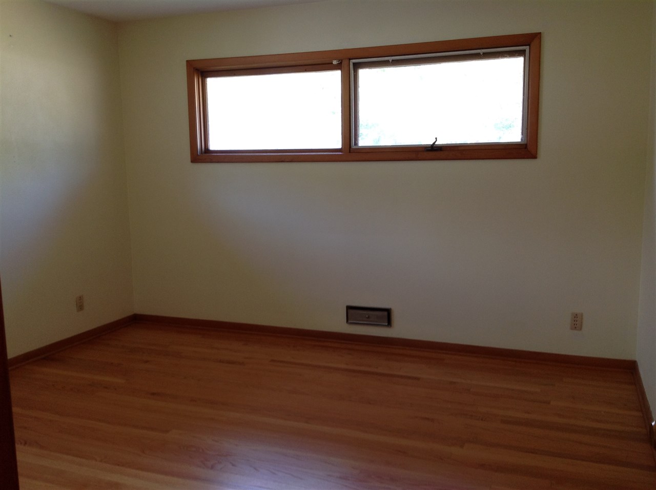3415 North View Road Rockford, IL 61107 - Photo 11 of 18 a view of a small space with wooden floor and a window