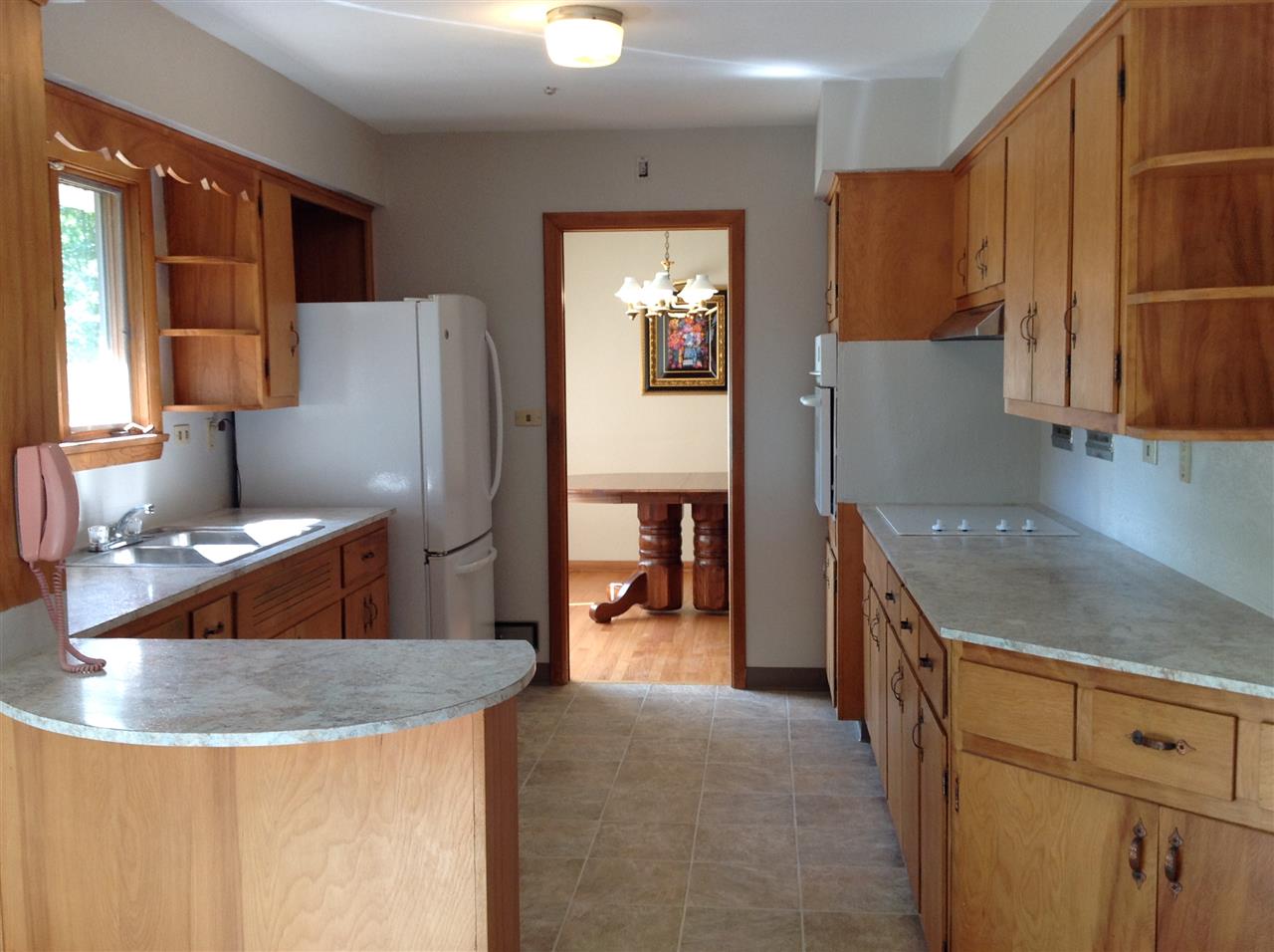 3415 North View Road Rockford, IL 61107 - Photo 8 of 18 a kitchen with stainless steel appliances granite countertop a refrigerator and a sink