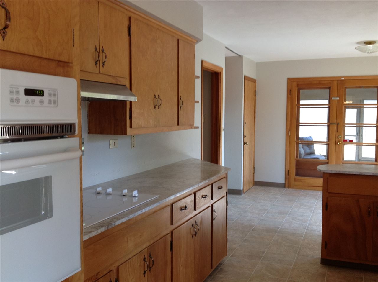 3415 North View Road Rockford, IL 61107 - Photo 9 of 18 a kitchen with stainless steel appliances granite countertop a stove a sink and a microwave