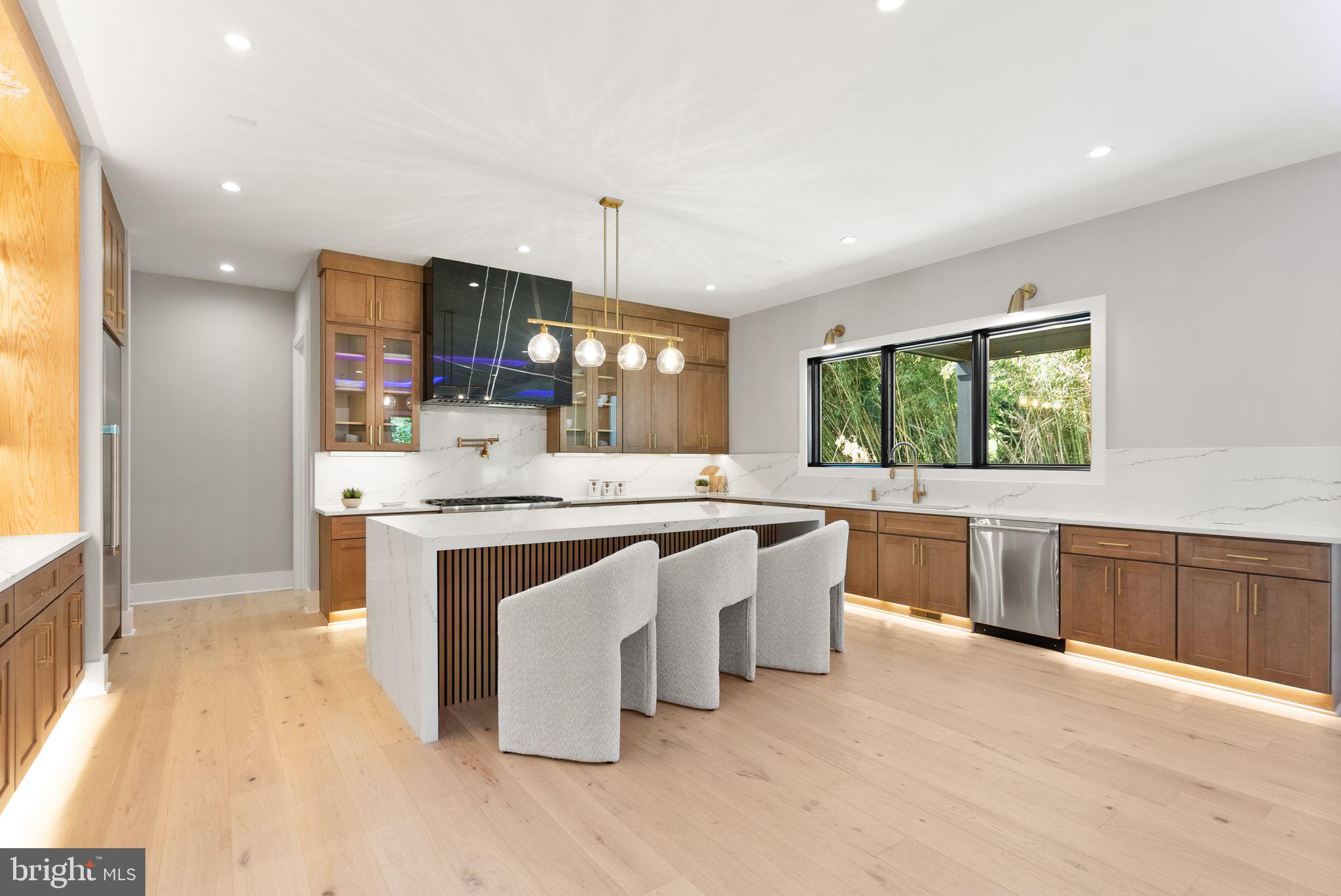 6329 Halsey Road McLean, VA 22101 - Photo 18 of 94 Sleek modern kitchen with natural light.