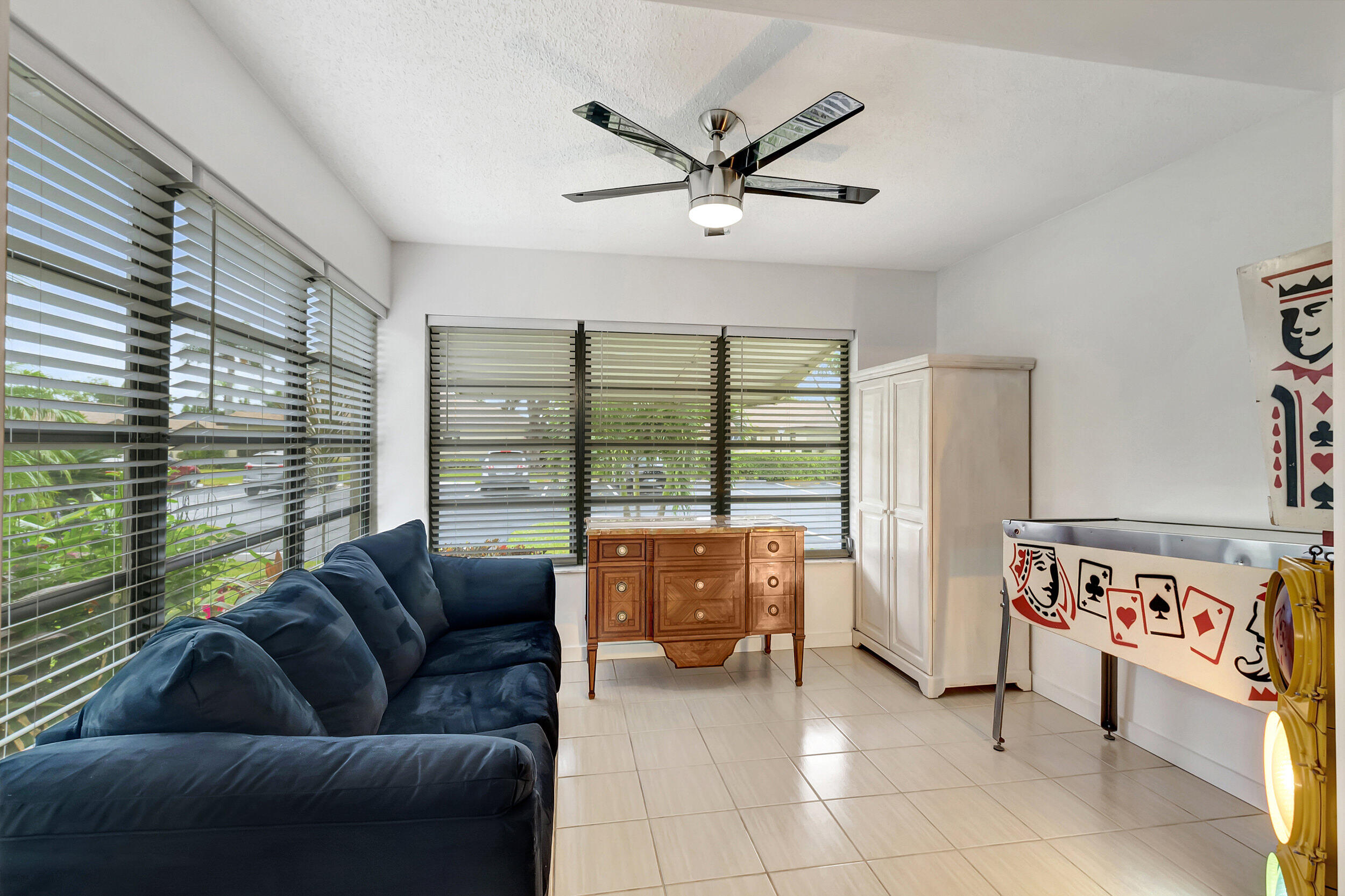 14040 Nesting Way, Unit B Delray Beach, FL 33484 - Photo 15 of 26 a living room with furniture and a window