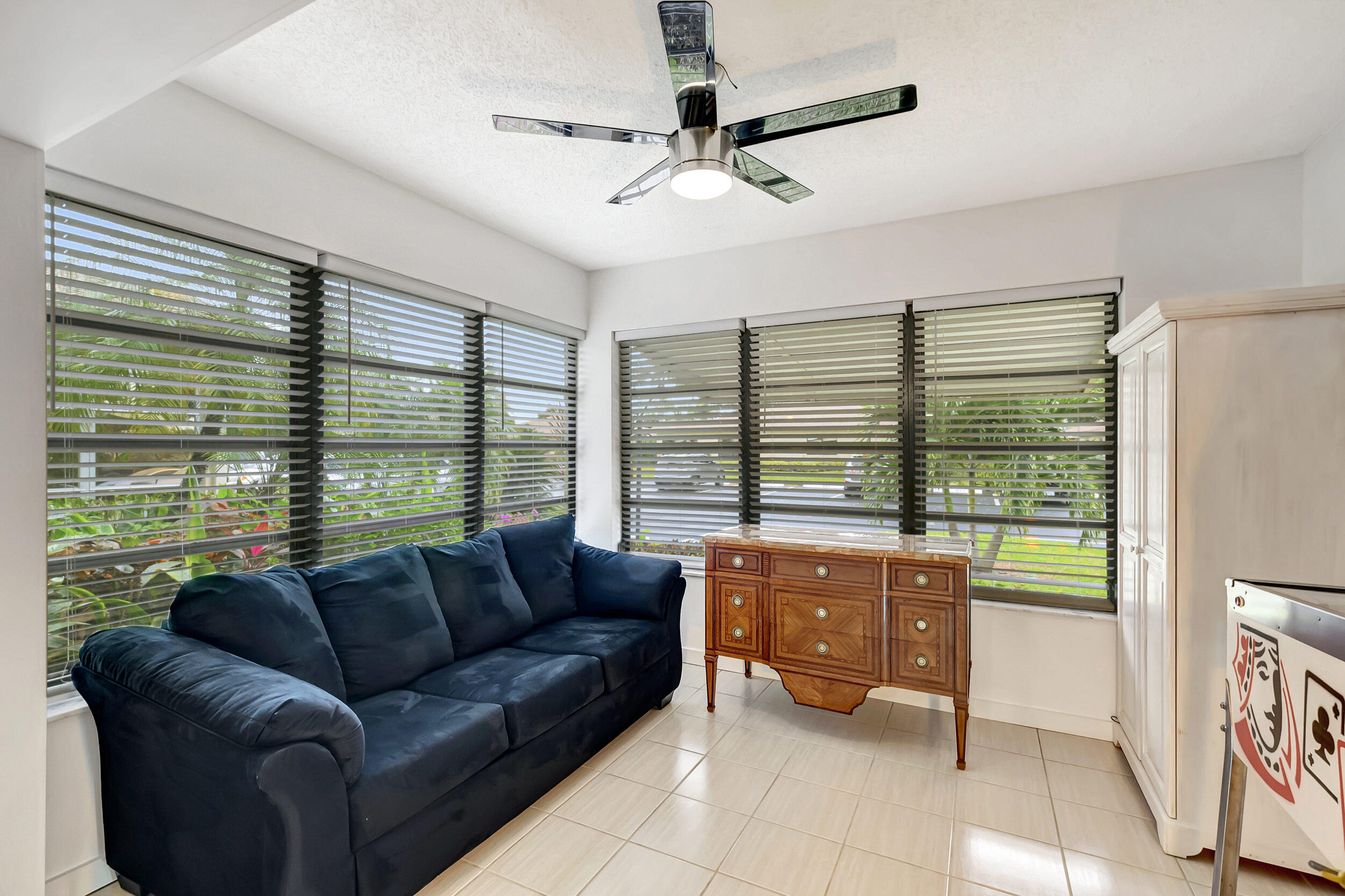 14040 Nesting Way, Unit B Delray Beach, FL 33484 - Photo 16 of 26 a living room with furniture and a large window