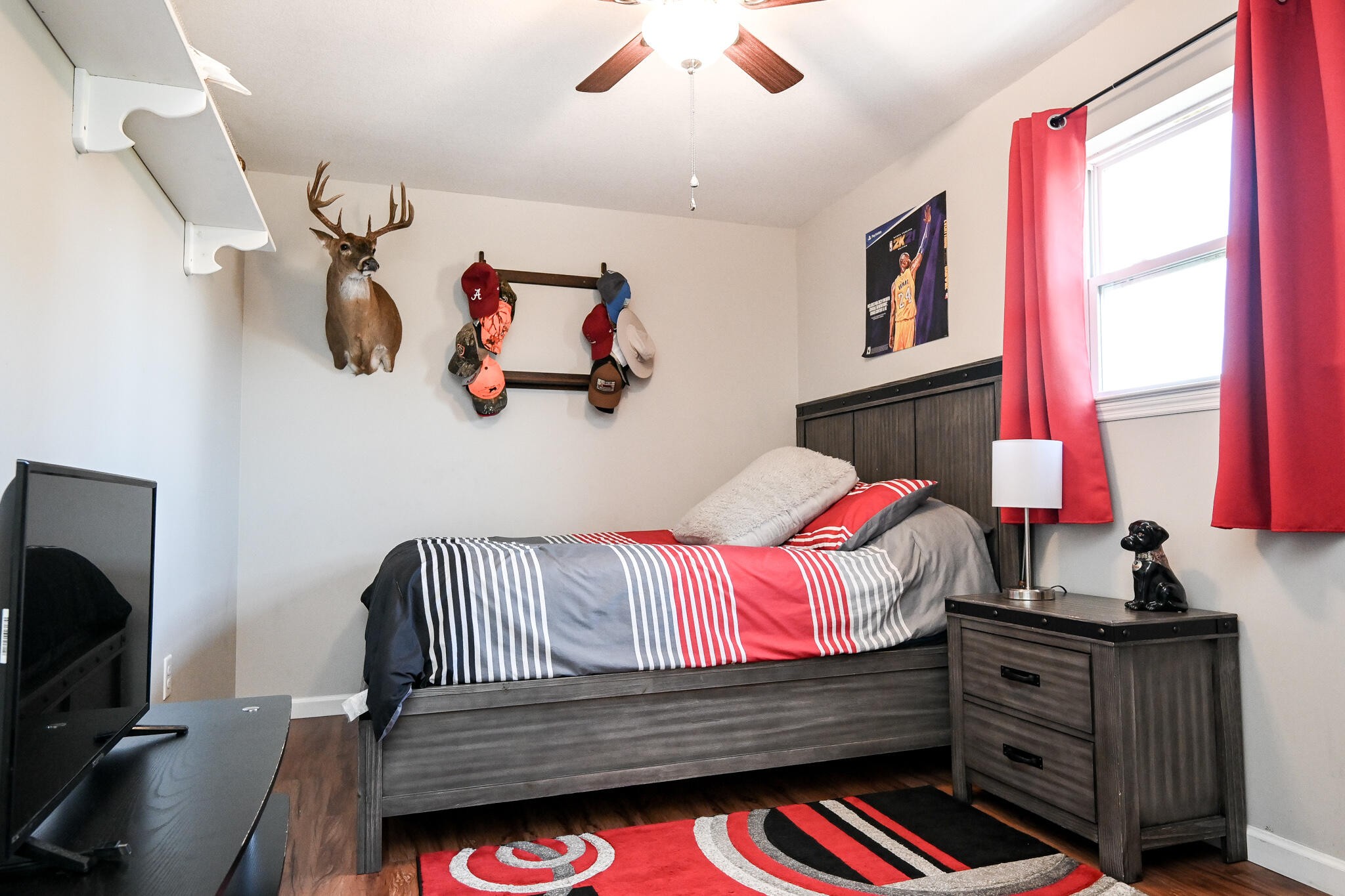 276 Mason Road McDonald, TN 37353 - Photo 46 of 67 a bedroom with a bed and wooden floor