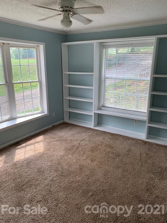 7596 Lowesville Meadows Road Stanley, NC 28164 - Photo 13 of 23 an empty room with a empty space and a window