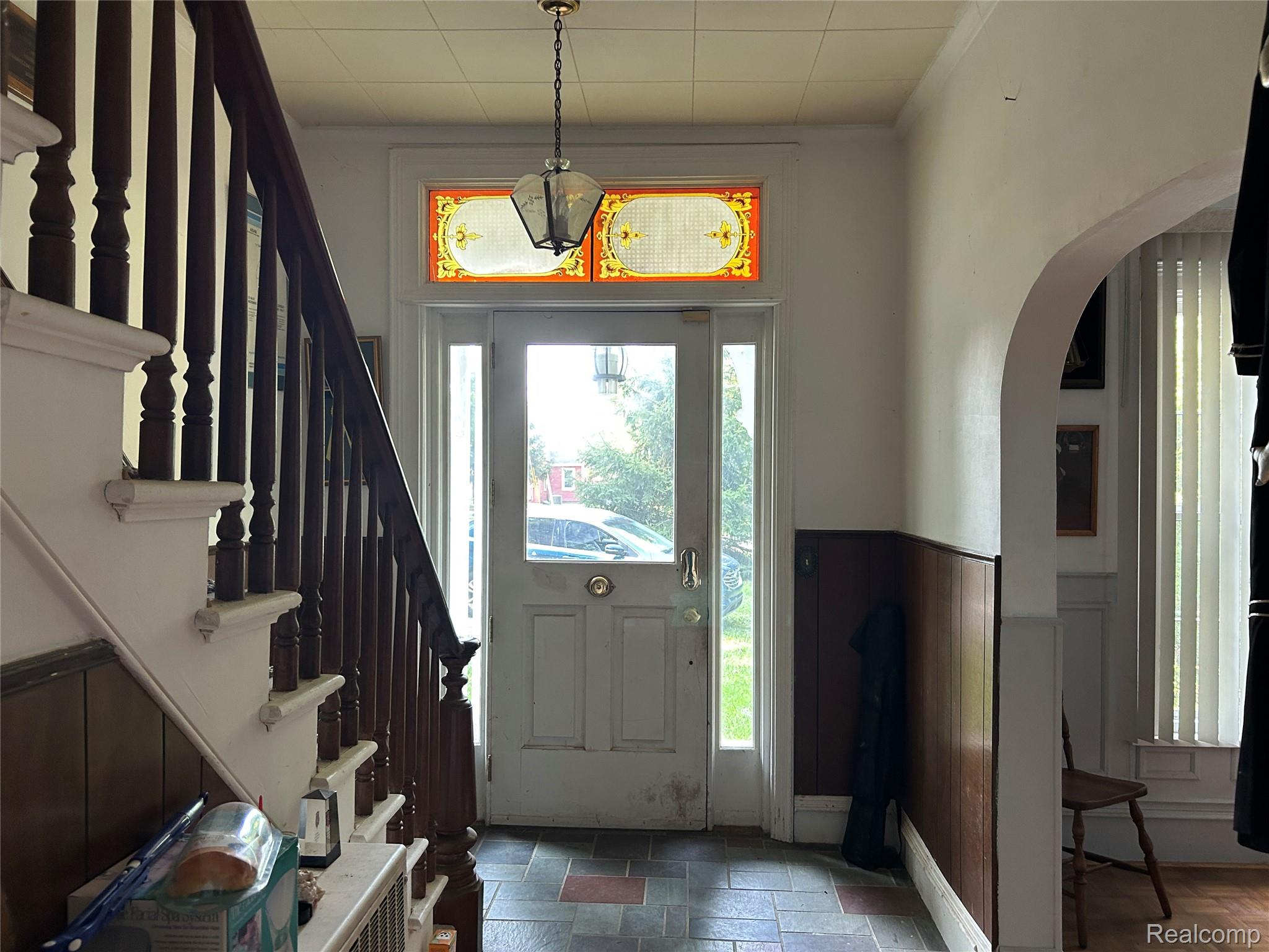 Charming Entrance Foyer with High Ceilings, Historic Door & Doorbell, Large Walk Coat Closet!