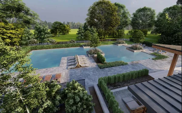 an aerial view of a house with garden space and a street view