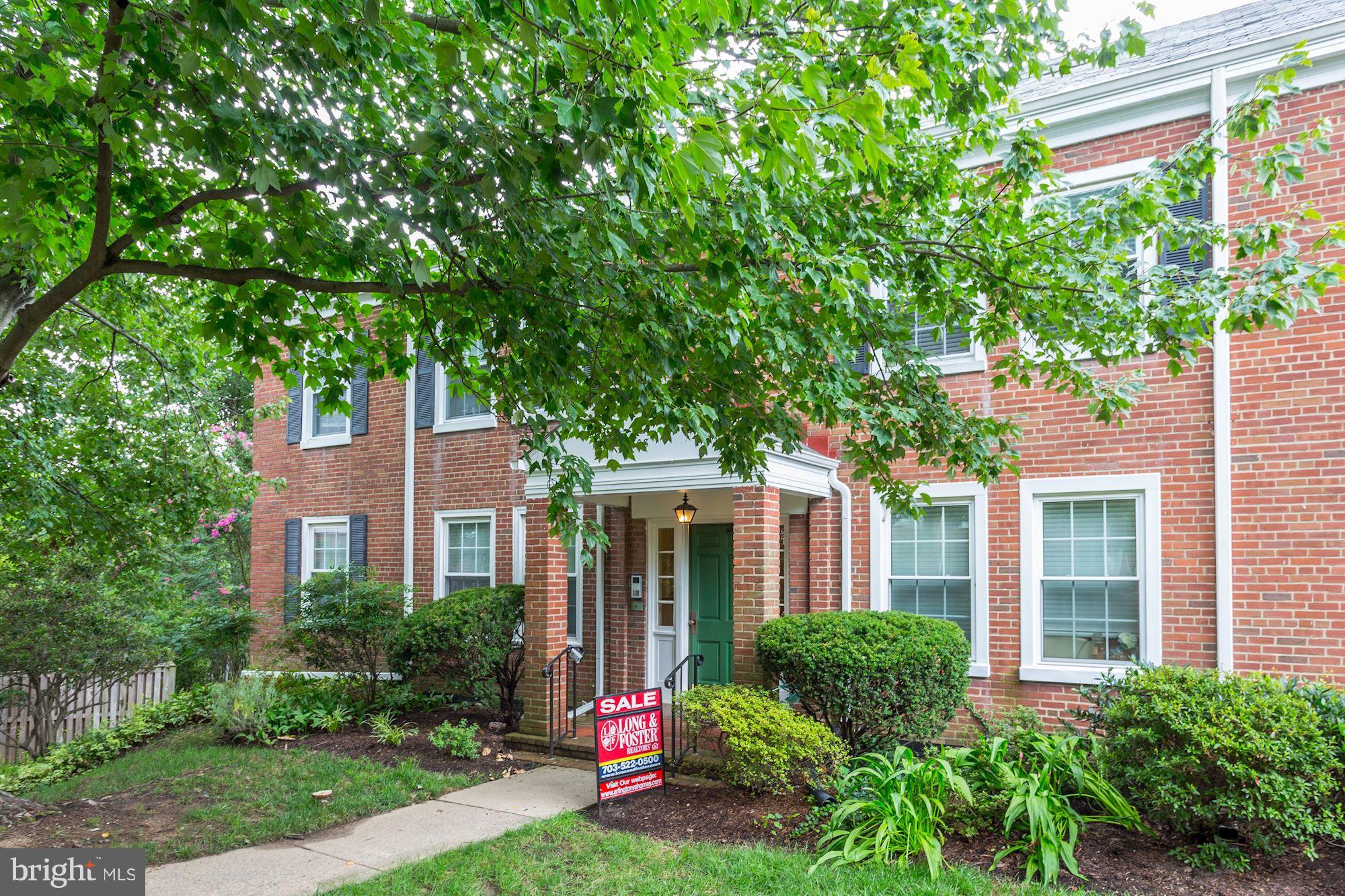 4608 31st Road South, Unit B2 Arlington, VA 22206 - Photo 1 of 29 a front view of a house with garden