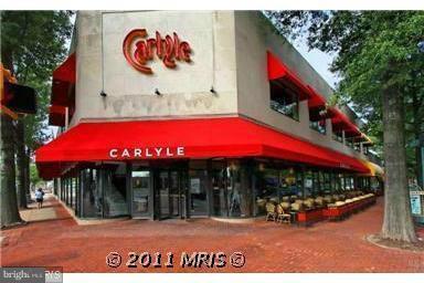 4608 31st Road South, Unit B2 Arlington, VA 22206 - Photo 27 of 29 a view of a cafe with a table and chairs under an umbrella