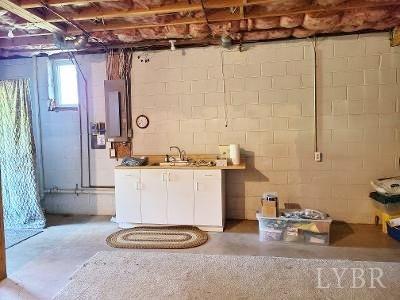 780 Vineyard Road Concord, VA 24538 - Photo 21 of 26 a bathroom with a sink a toilet and shower