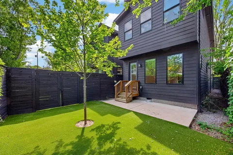 a house view with a backyard space
