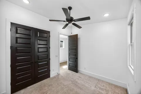 a view of room with closet and window