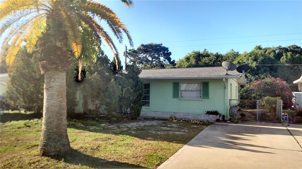 504 Briarwood Road Venice, FL 34293 - Photo 1 of 1 a view of a house with a yard