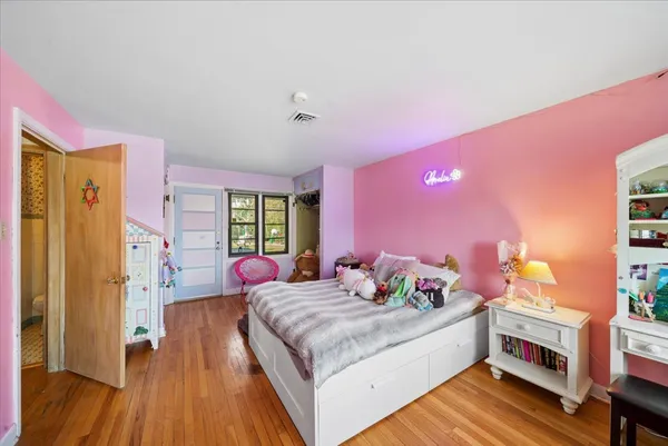 a bed room with a bed and a couch