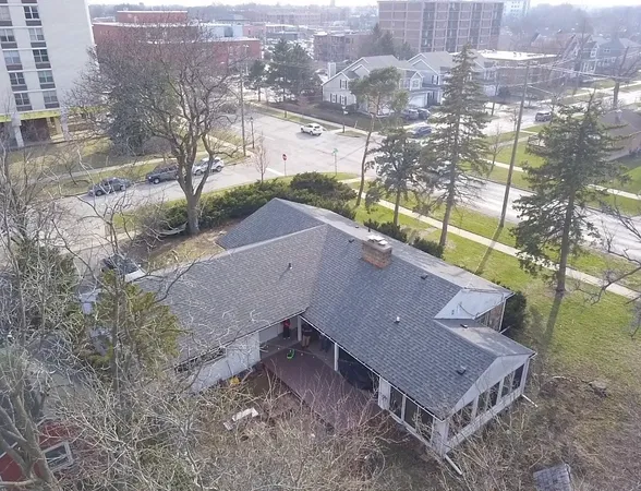 a view of a houses with a yard