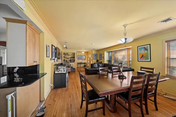 a view of a dining room with furniture