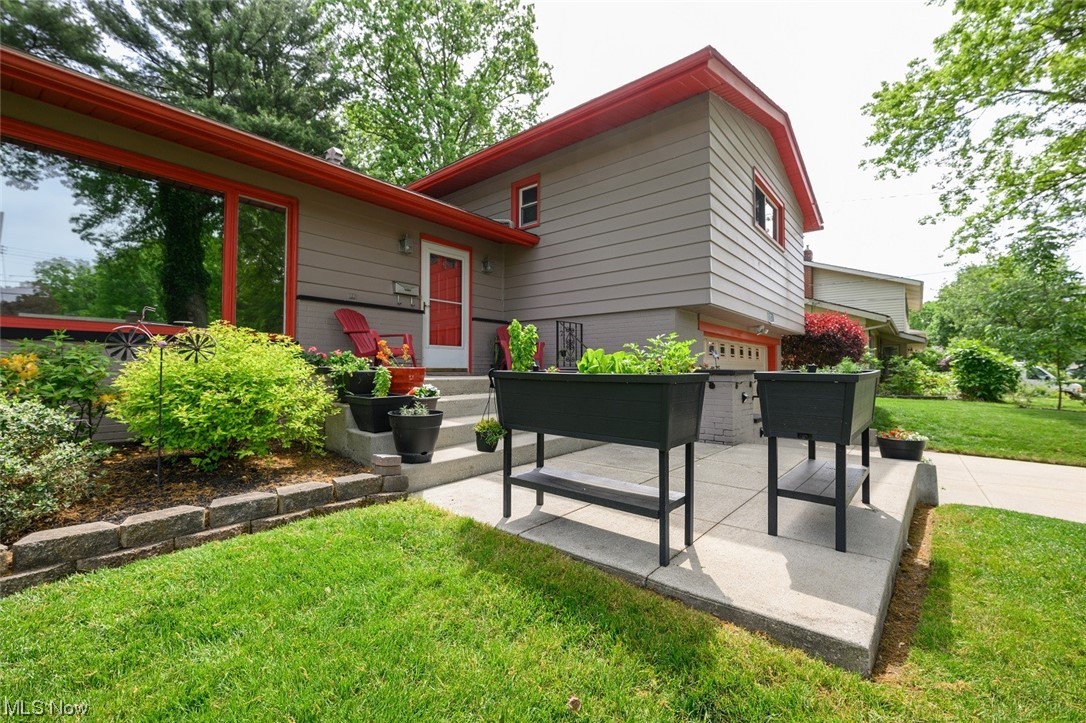572 Overwood Road Akron, OH 44313 - Photo 4 of 35 View of front yard featuring a patio