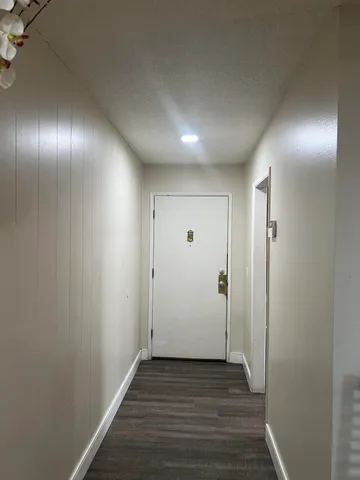 a view of balcony with furniture