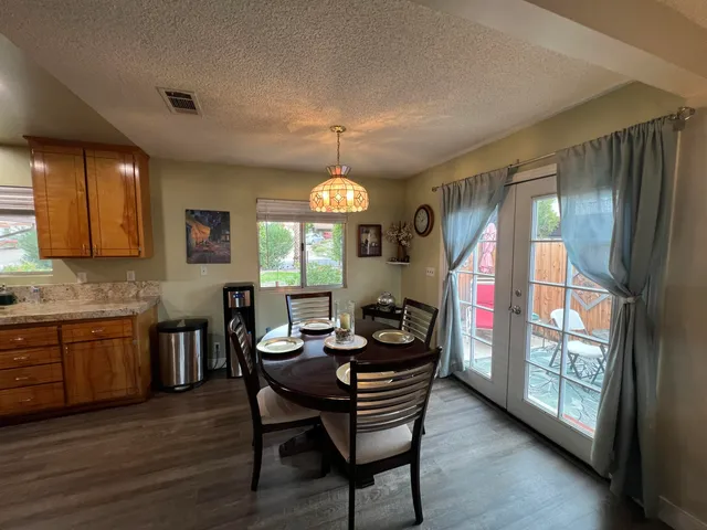 a view of a chairs in wooden deck