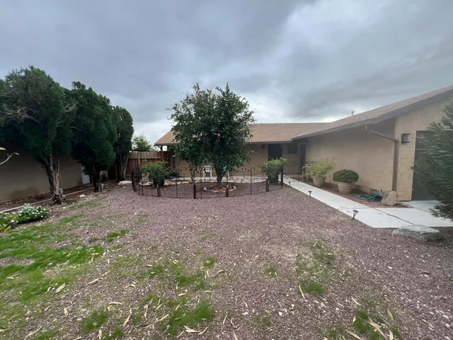 a view of outdoor space with deck and outdoor seating
