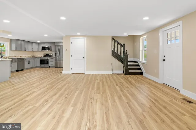 a view of kitchen and wooden floor