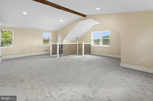 a view of a hallway with front door