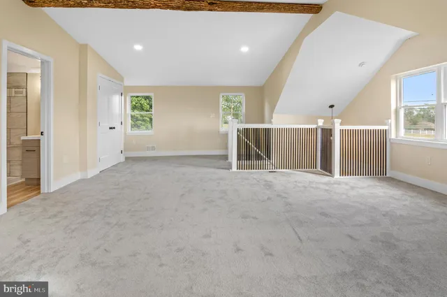 a bathroom with a toilet and shower