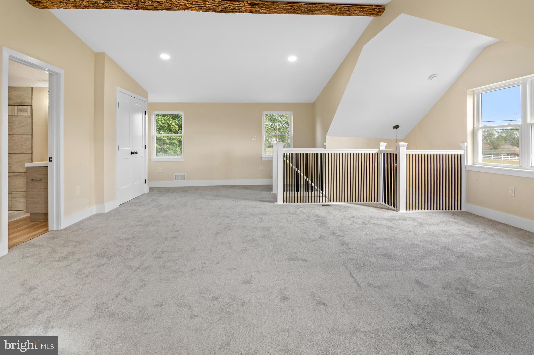 1741 Liberty Grove Road Colora, MD 21917 - Photo 36 of 55 en empty room with windows and pillars in it