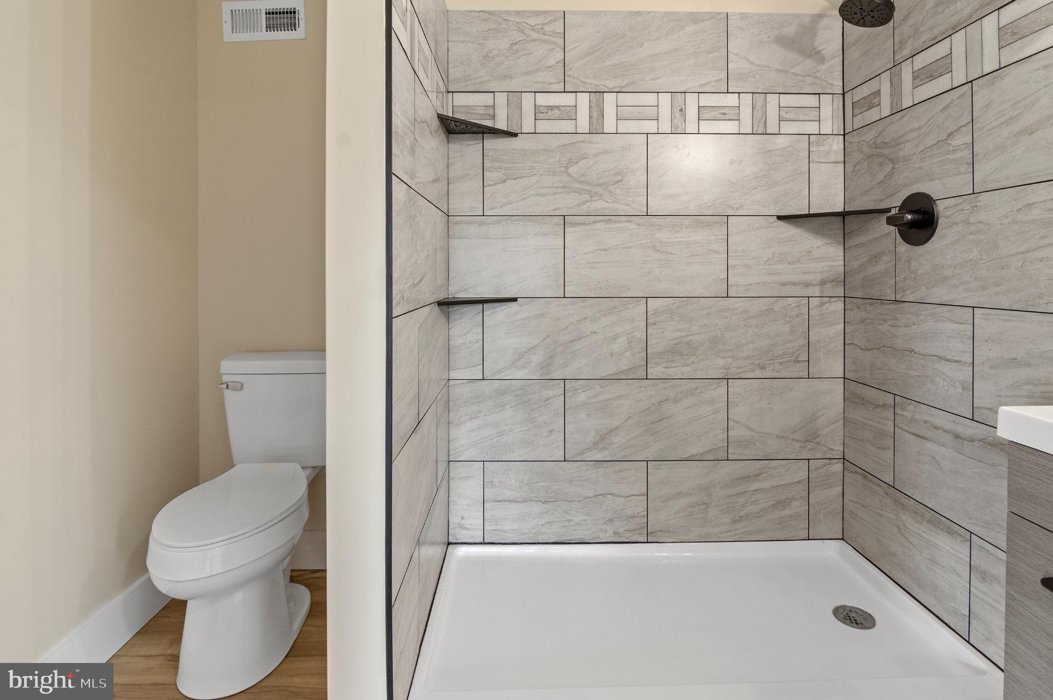 1741 Liberty Grove Road Colora, MD 21917 - Photo 41 of 55 a bathroom with a toilet and shower