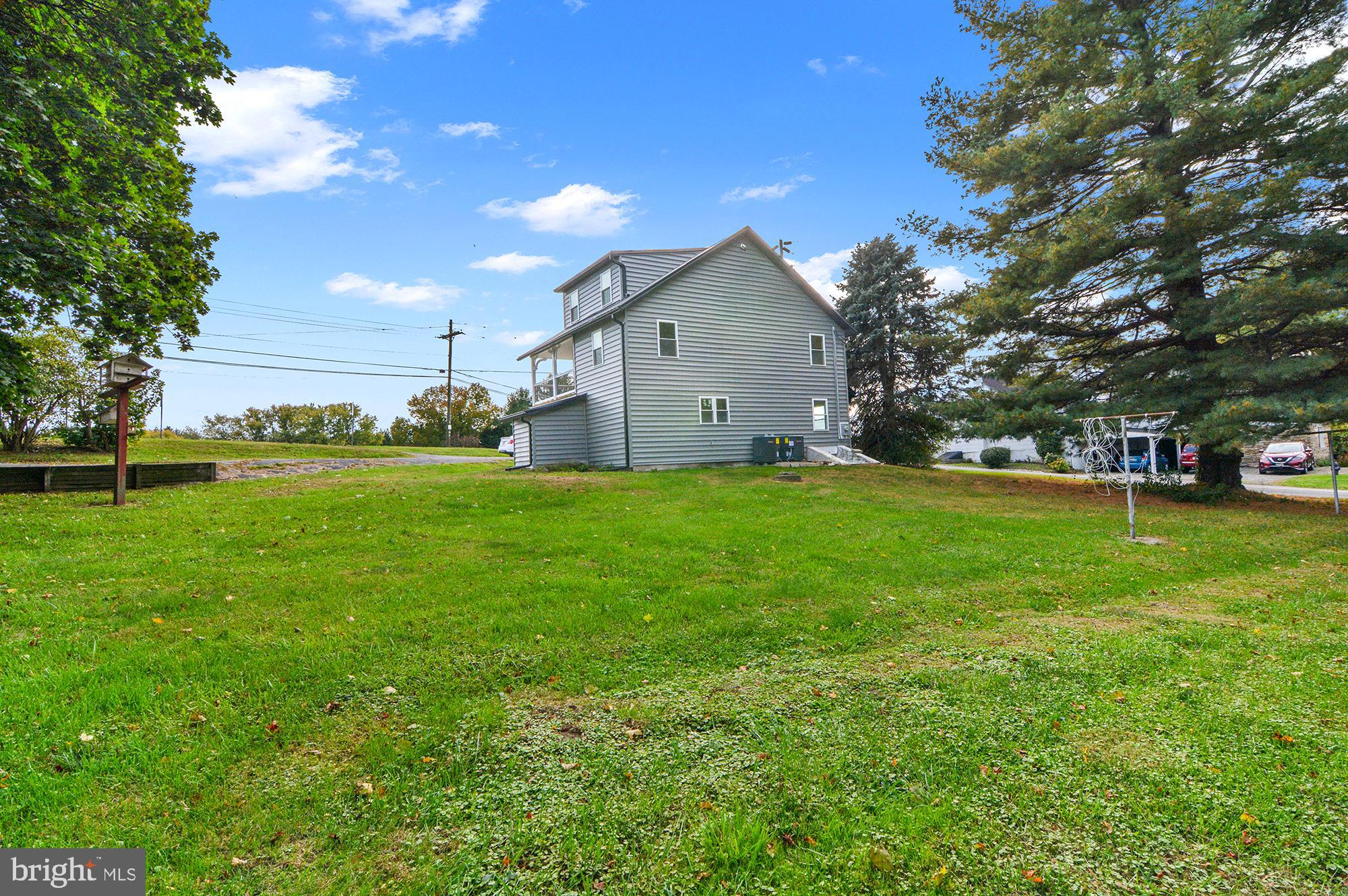 1741 Liberty Grove Road Colora, MD 21917 - Photo 47 of 55 a front view of a house with garden