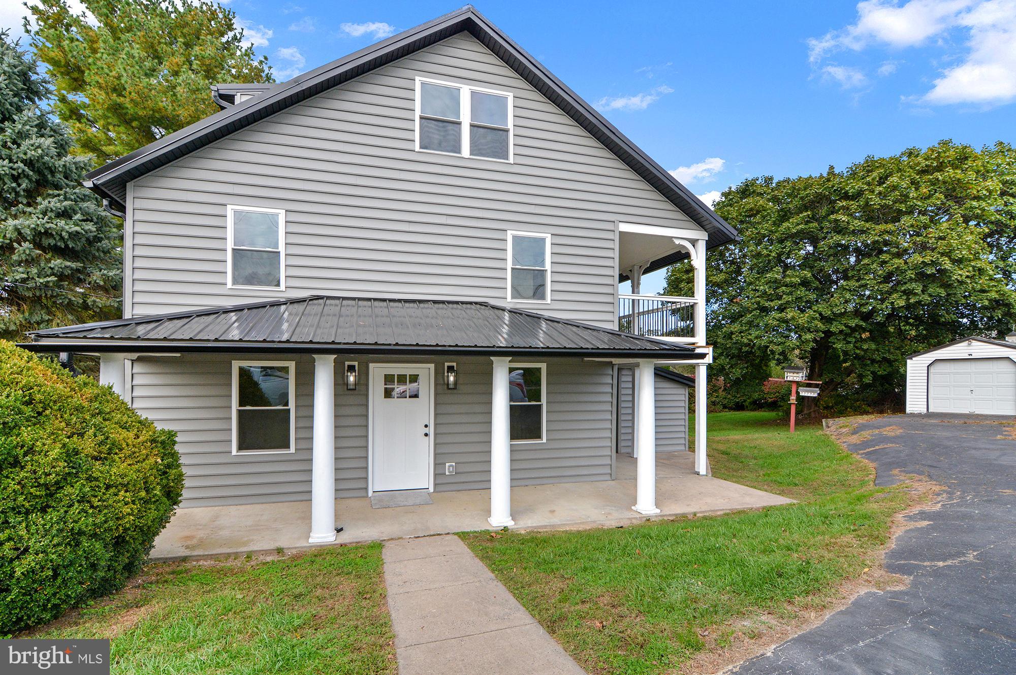 1741 Liberty Grove Road Colora, MD 21917 - Photo 54 of 55 a front view of a house with a yard