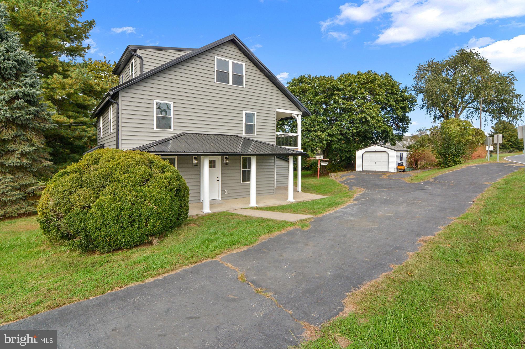 1741 Liberty Grove Road Colora, MD 21917 - Photo 55 of 55 a view of a house with a yard and large tree