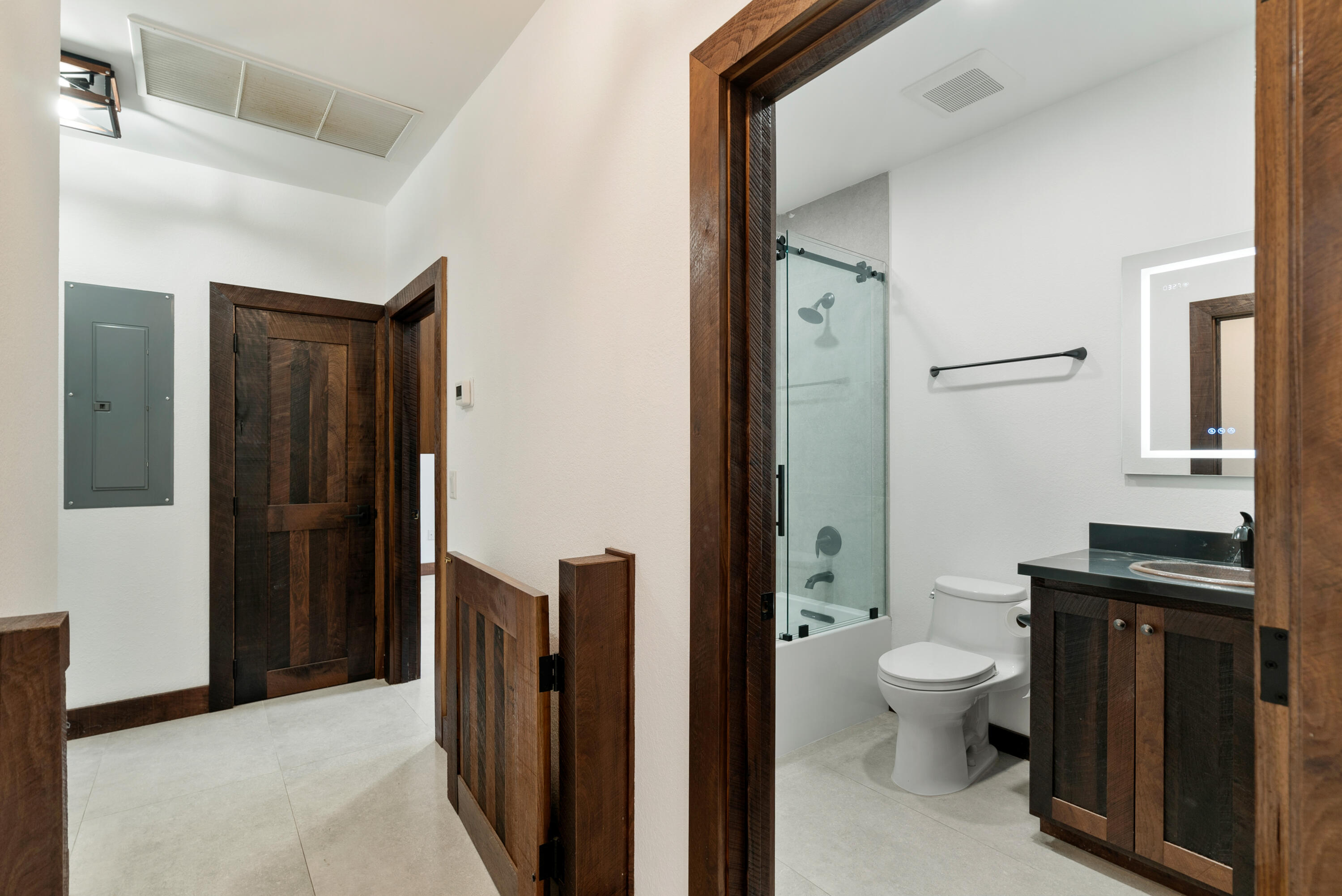 85 Henry Morgan Drive Key Largo, FL 33037 - Photo 13 of 40 a bathroom with a granite countertop sink toilet and shower