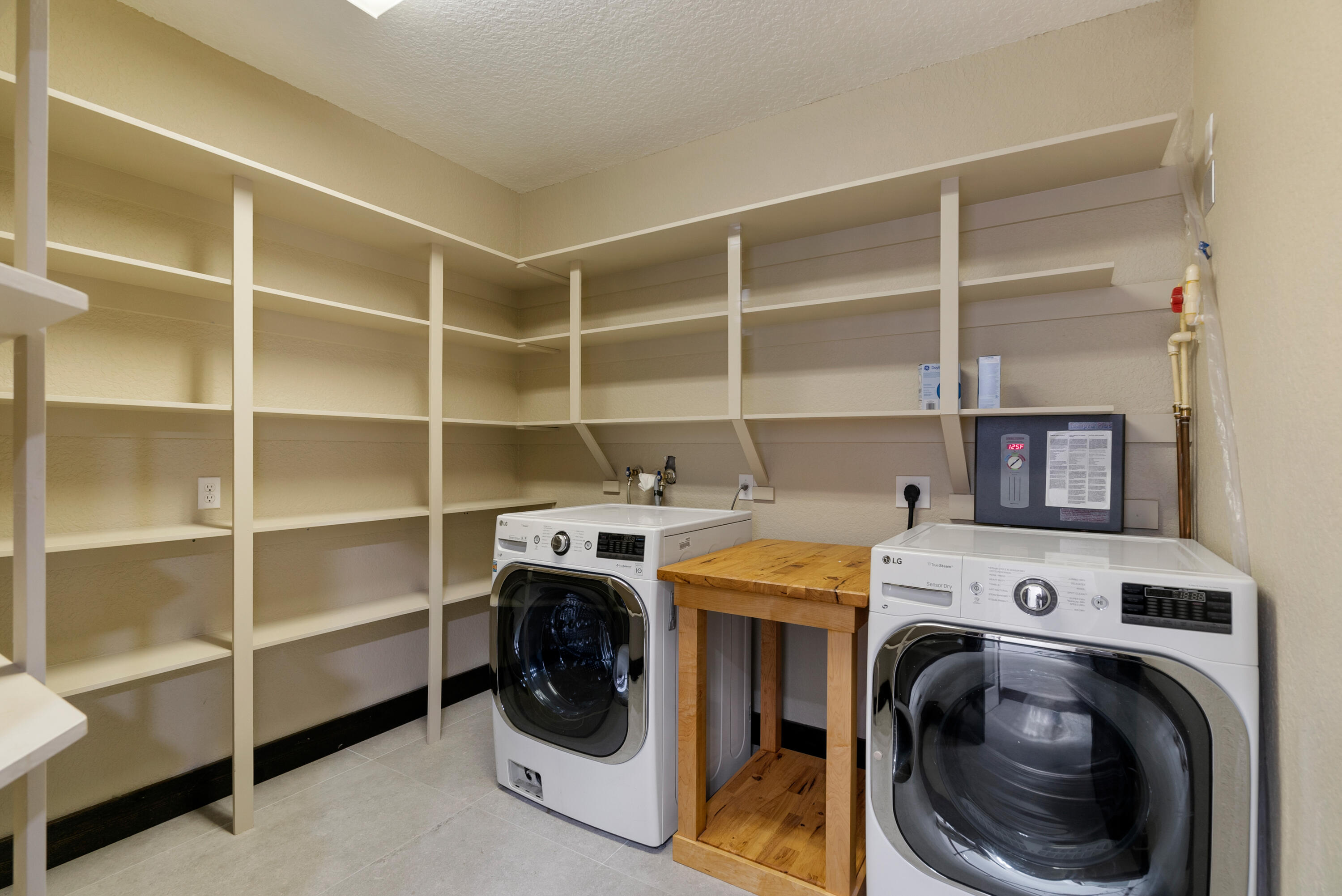 85 Henry Morgan Drive Key Largo, FL 33037 - Photo 27 of 40 a view of washer and dryer in a utility room