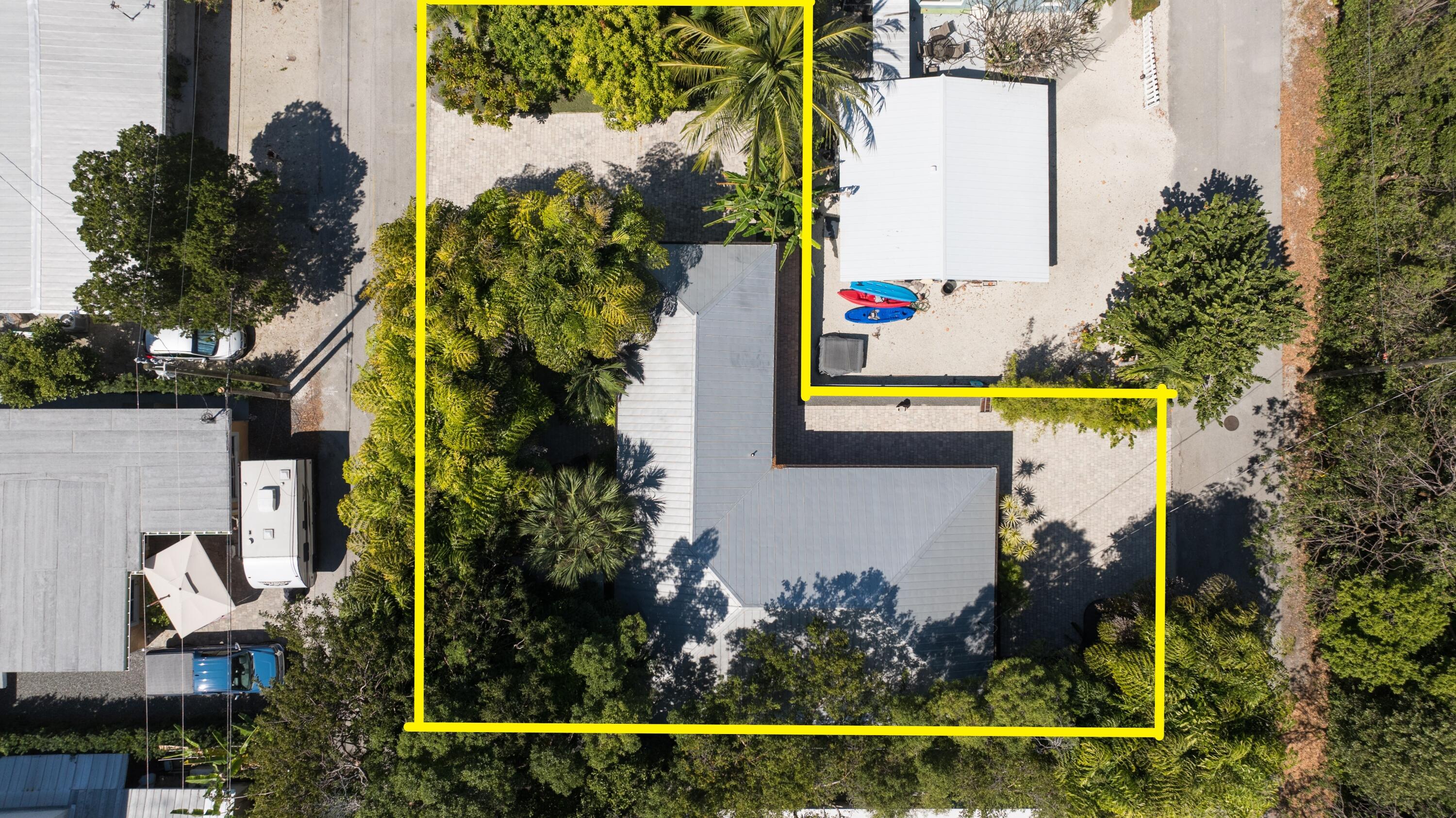 85 Henry Morgan Drive Key Largo, FL 33037 - Photo 28 of 40 an aerial view of a house with swimming pool and garden