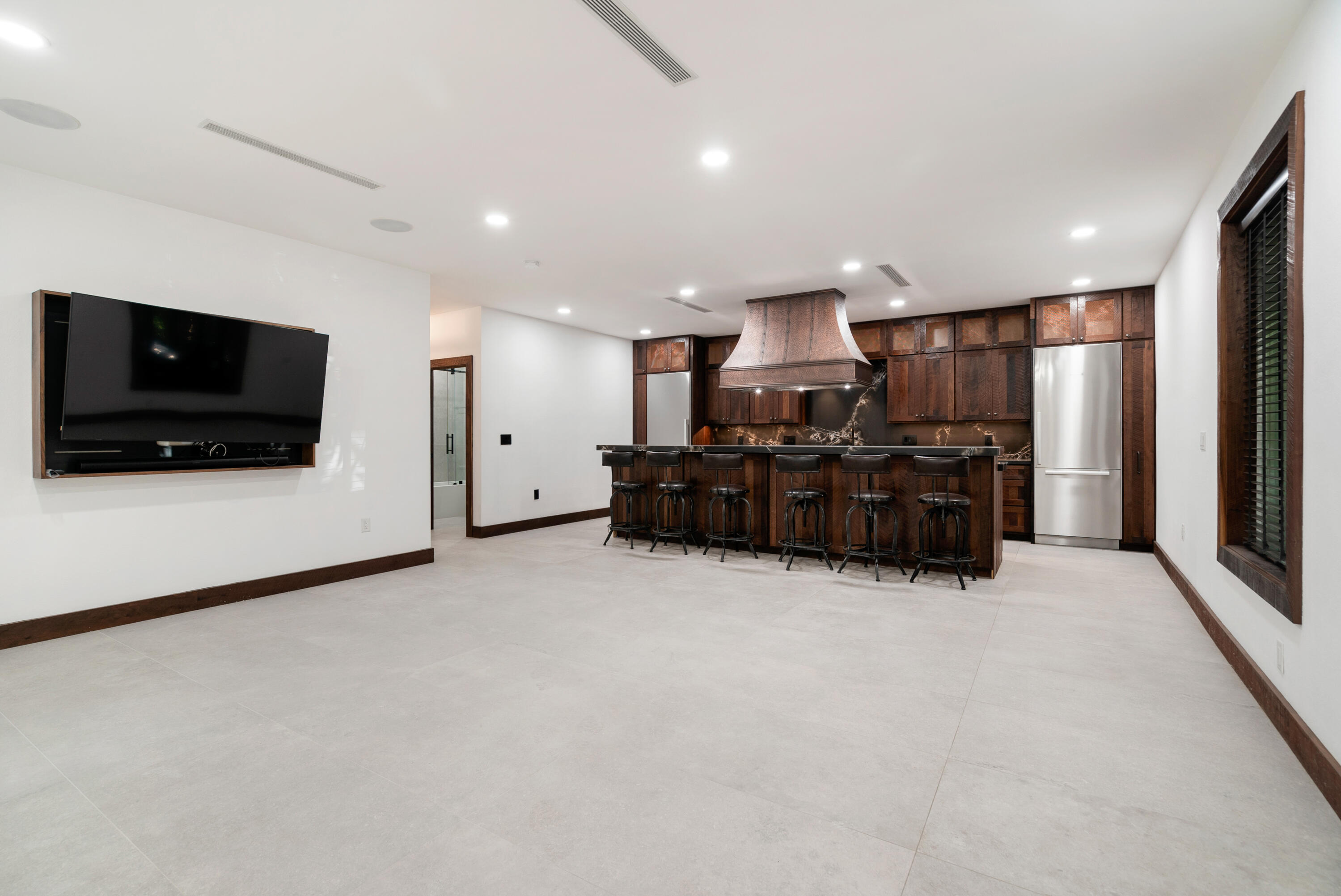 85 Henry Morgan Drive Key Largo, FL 33037 - Photo 6 of 40 a living room with furniture and a flat screen tv