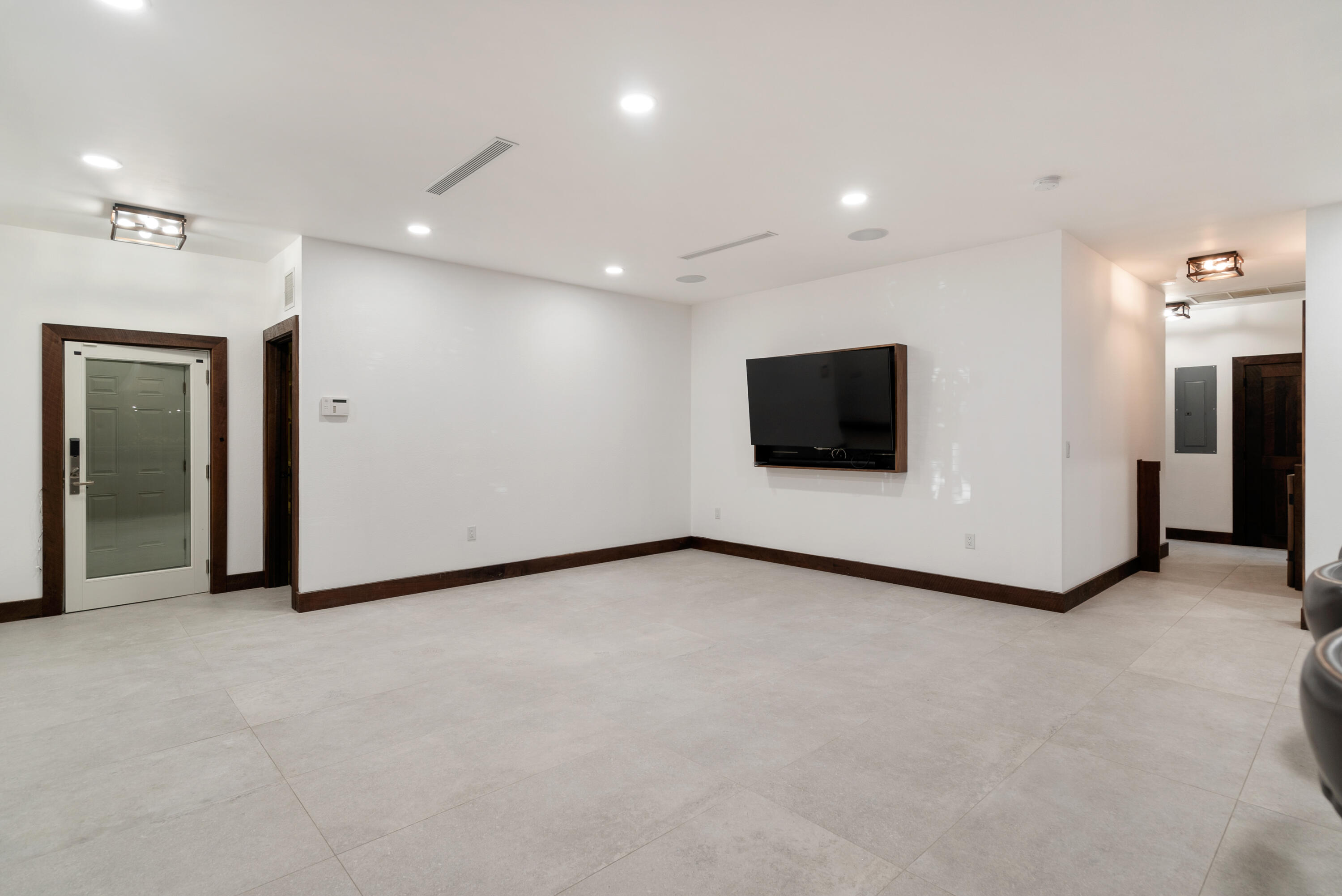 85 Henry Morgan Drive Key Largo, FL 33037 - Photo 7 of 40 a view of an empty room with a tv