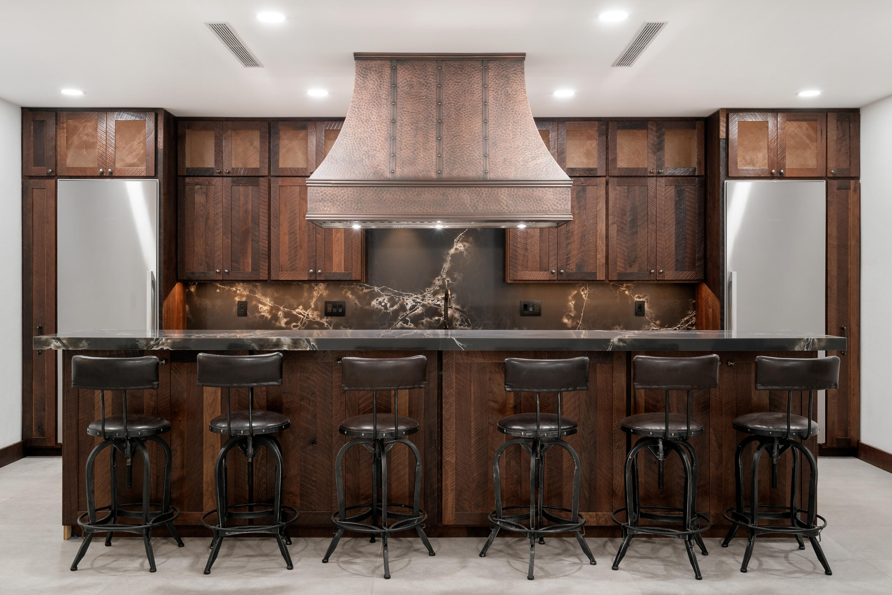 85 Henry Morgan Drive Key Largo, FL 33037 - Photo 8 of 40 a kitchen with chairs and cabinets