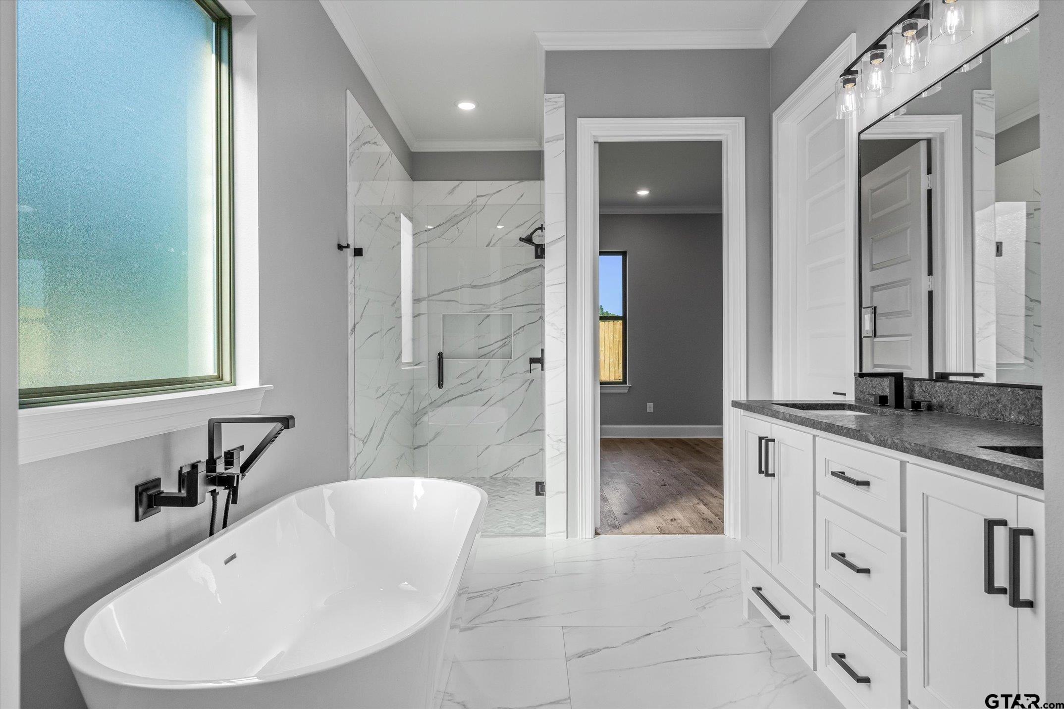 403 Sides Bullard, TX 75757 - Photo 15 of 33 a bathroom with a granite countertop sink and a mirror
