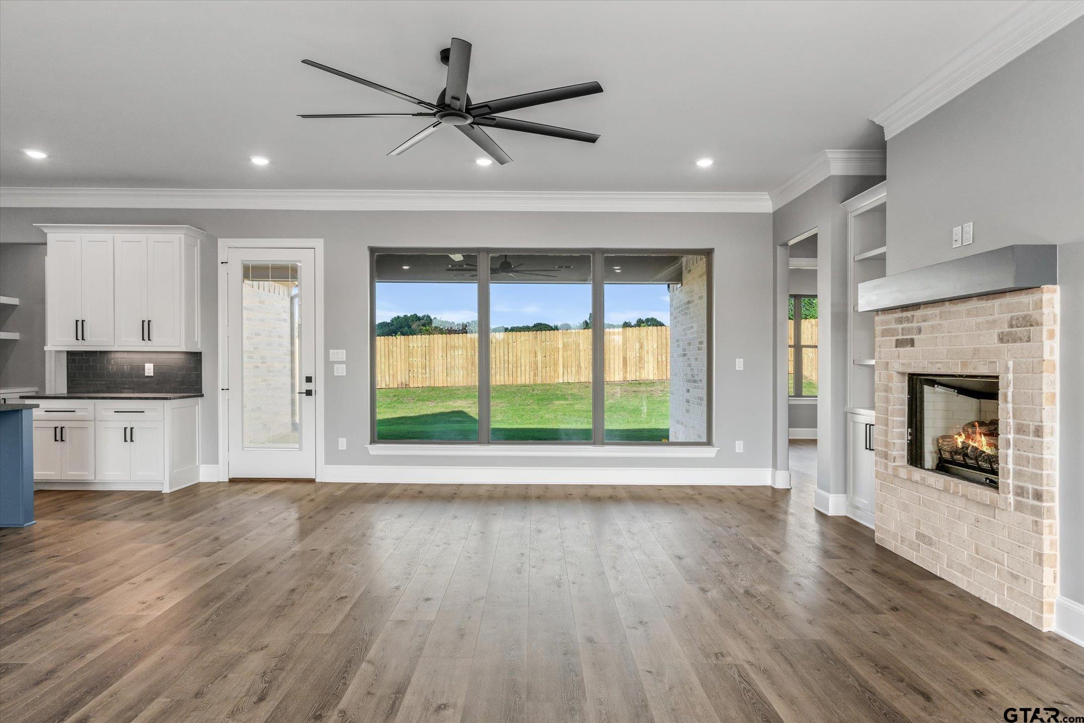 403 Sides Bullard, TX 75757 - Photo 22 of 33 a view of a kitchen with a sink and a window