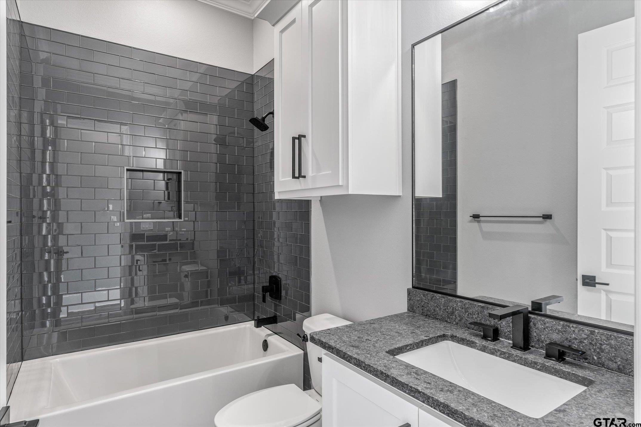 403 Sides Bullard, TX 75757 - Photo 26 of 33 a bathroom with a granite countertop sink toilet and shower