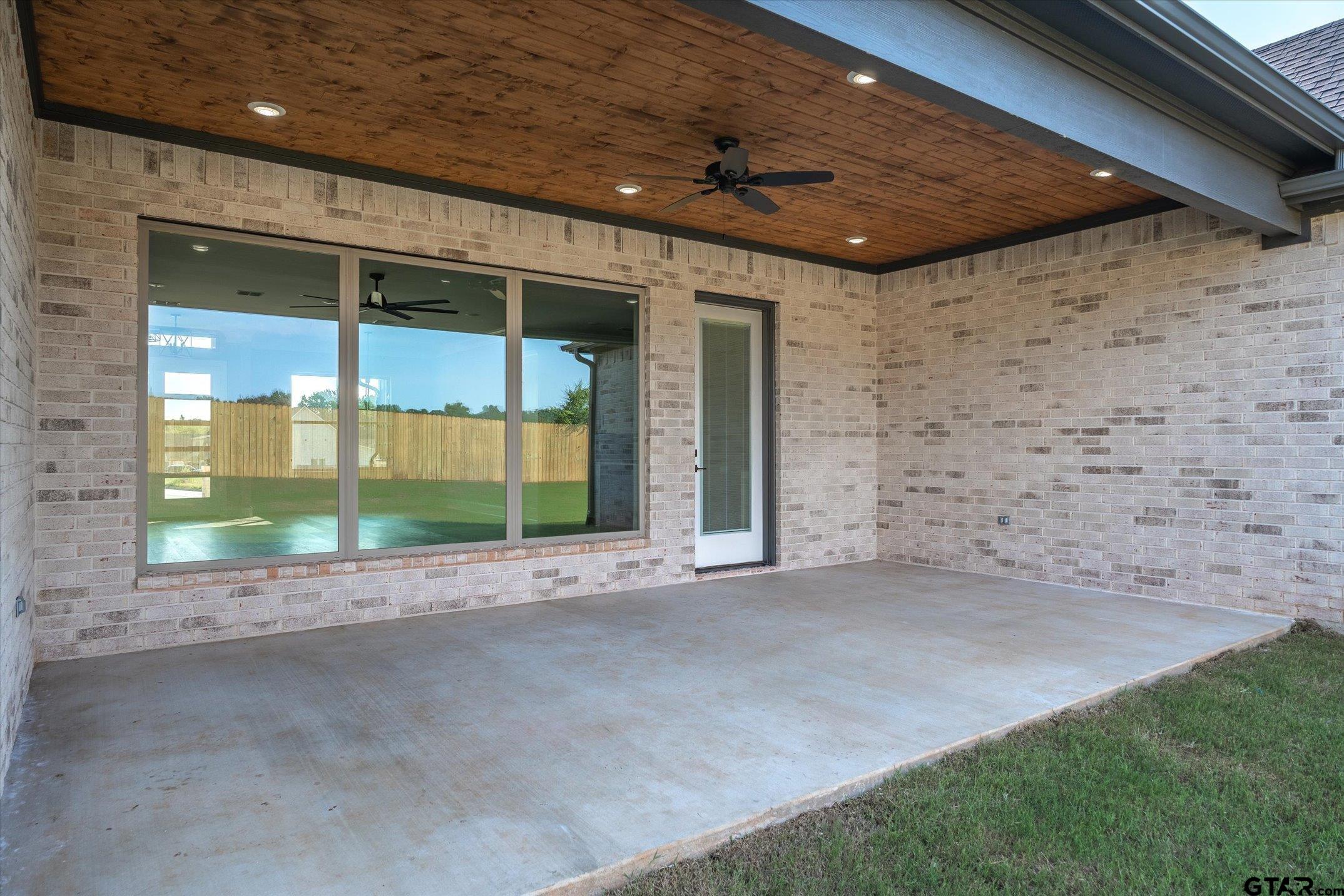 403 Sides Bullard, TX 75757 - Photo 30 of 33 a view of an empty room with a sliding door