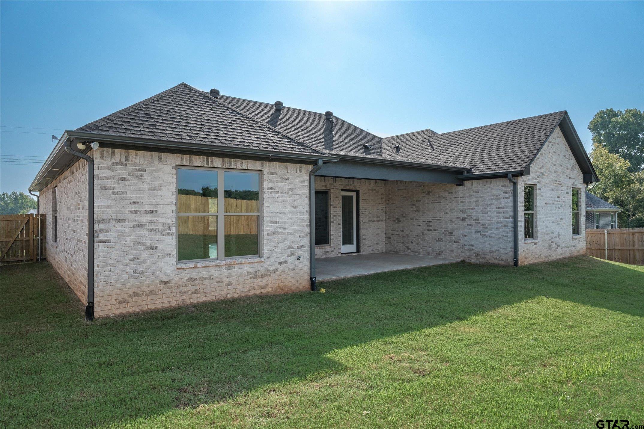 403 Sides Bullard, TX 75757 - Photo 32 of 33 a front view of a house with a garden
