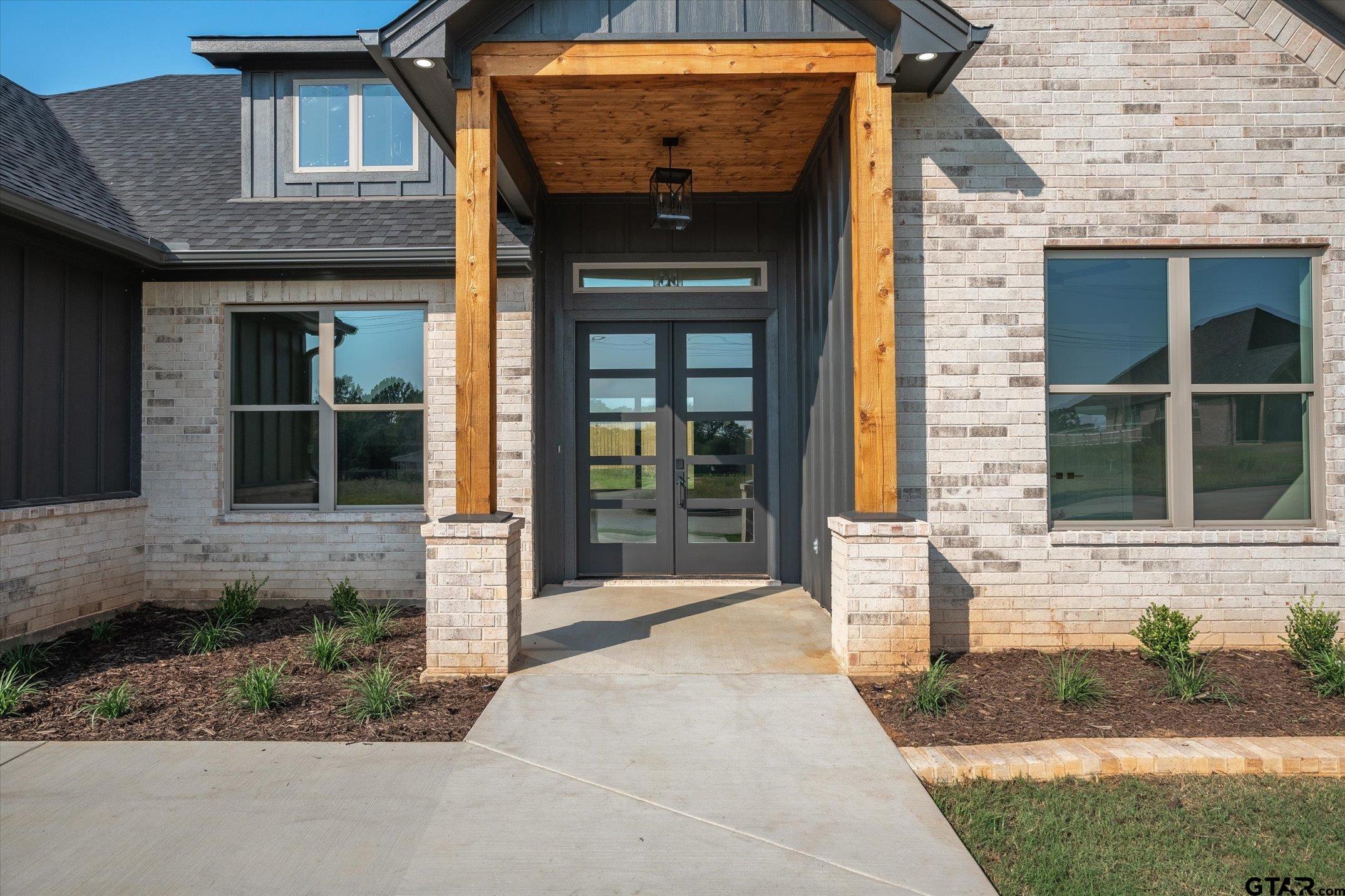403 Sides Bullard, TX 75757 - Photo 4 of 33 a front view of a house with a yard