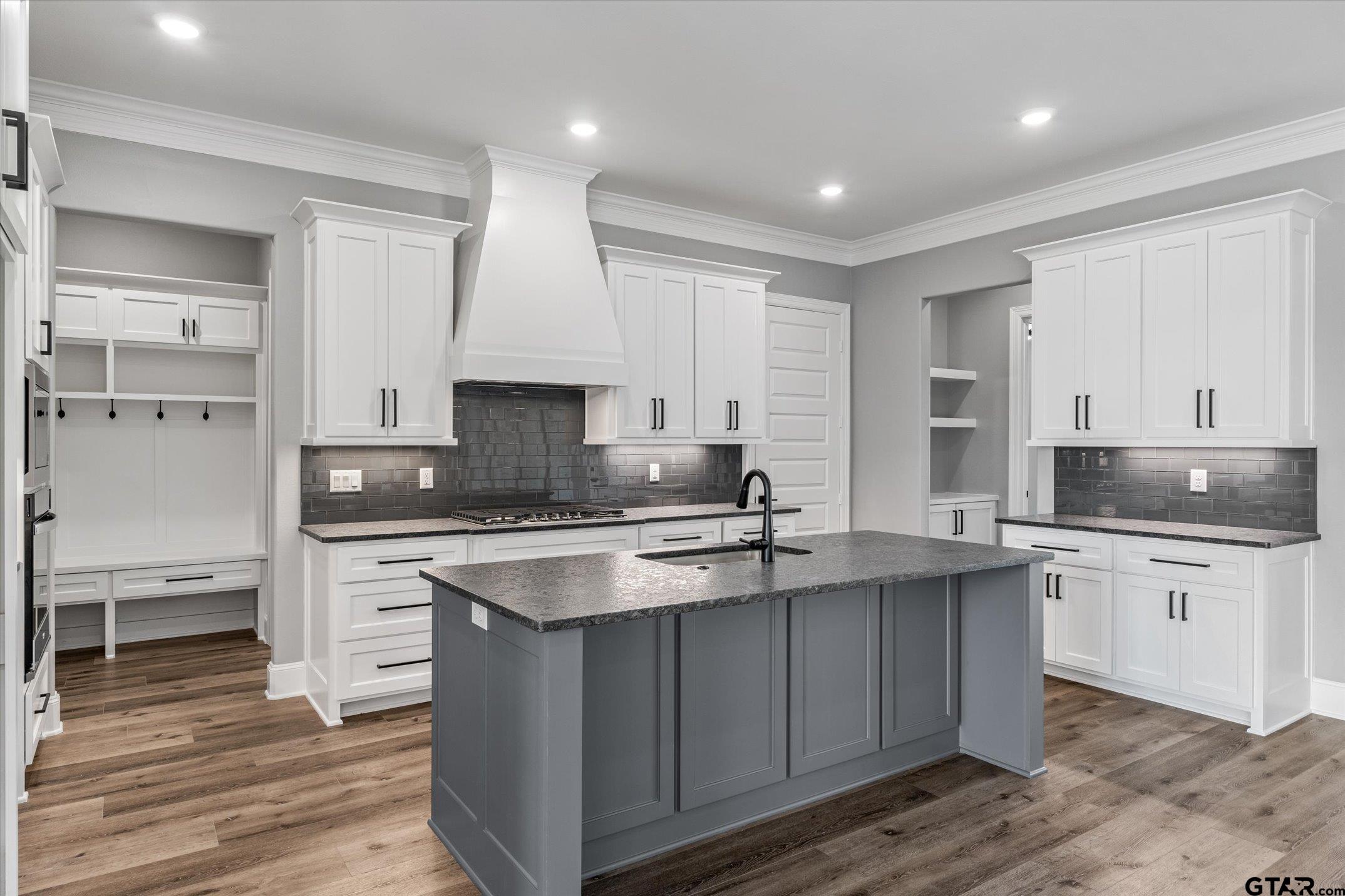 403 Sides Bullard, TX 75757 - Photo 7 of 33 a kitchen with stainless steel appliances granite countertop a sink stove and refrigerator