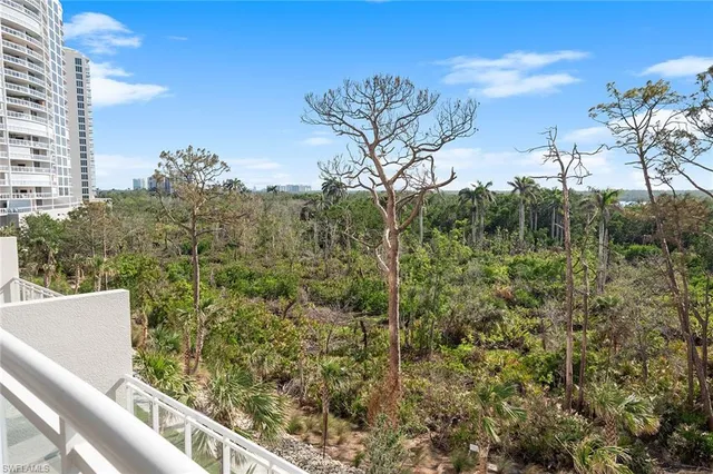 a view of a garden from a balcony